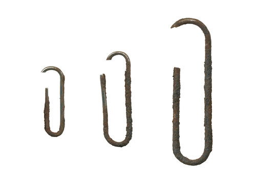 Vintage rusted paper clips set isolated.