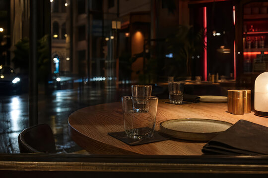 Rainy City Cafe With Layered Restaurant Depth And Contemporary Cafe Dining