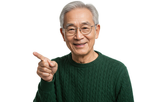 Elderly asian male model (68) in forest green sweater and glasses, smiling and pointing sharply in a high-key, infinite white studio half-body portrait. Concept of guidance and invitation