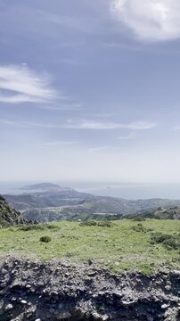 Near Fnideq, Morocco &ndash; May 1, 2026: A breathtaking mountain viewpoint reveals the city of Ceuta surrounded by dramatic hills and green landscapes under a clear spring sky.