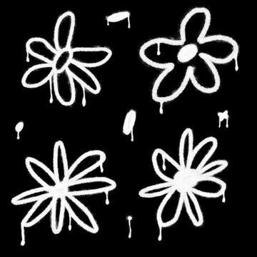 White spray paint flower silhouettes with drips isolated on black background