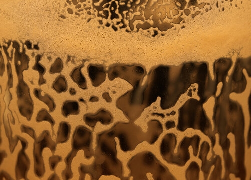 Abstract coffee foam residue inside cappuccino cup symbolizing morning routine creativity inspiration and productive workday background. 