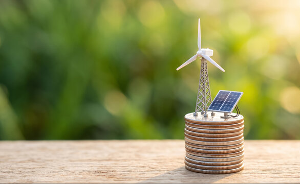 Renewable Energy Investment Growth with Coins and Solar Panel
