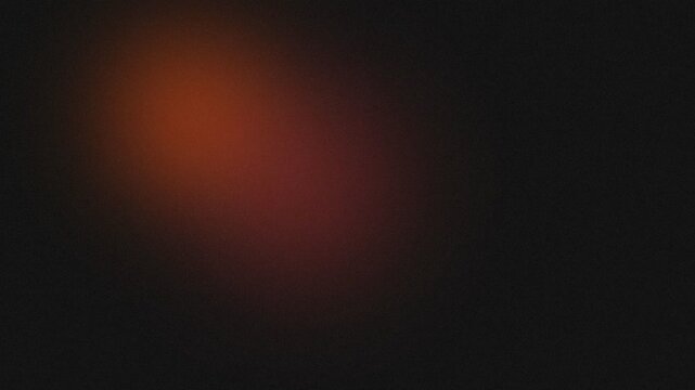 Abstract Pixelated Light Glow on Dark Background with Shifting Colors.