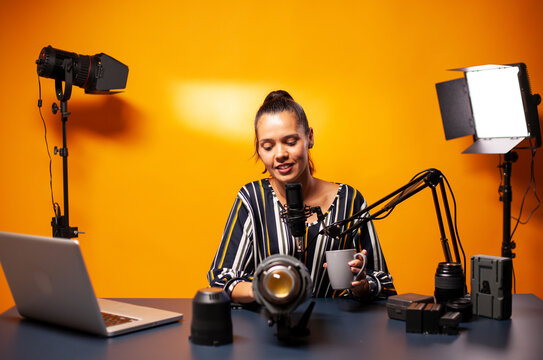 Creators discussing continuous light for filming inside a home studio setup where filming gear and technical details support content creation.