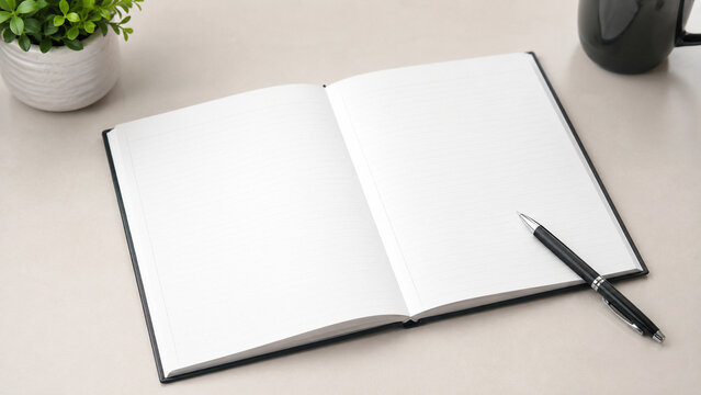 Carnet ouvert avec stylo sur bureau &eacute;pur&eacute;