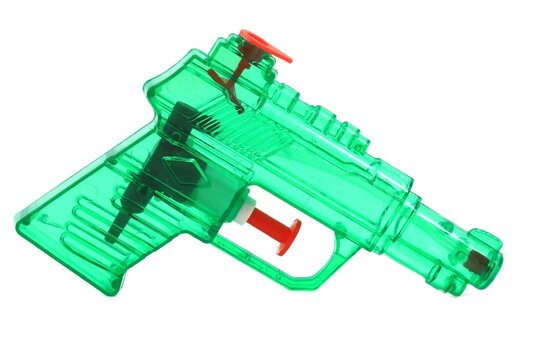 Plastic squirt gun isolated on white background
