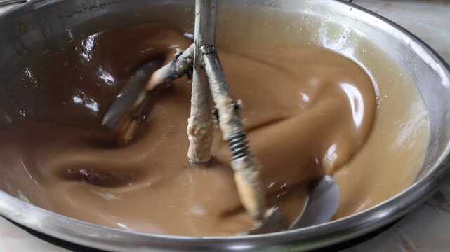  Cononut candy is made in the factory at My Tho, Vietnam