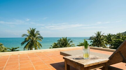 Fototapeta premium Fresh coconut water on luxury resort terrace overlooking ocean