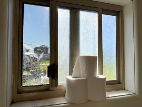 Ambient sunlight view of toilet window slide doors