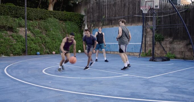 Diverse men on blue court ball baseline starting drive contesting shot scramble resetting to score