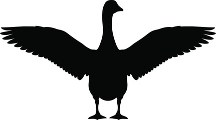 Black silhouette illustration of a standing goose with large spread open wings isolated on a white background © Rokon