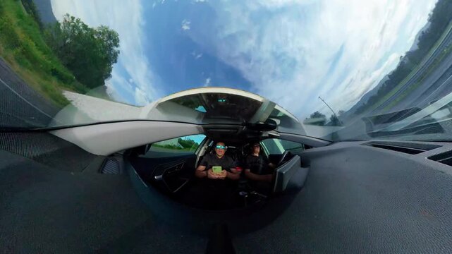 Spherical 360 view of men driving on mexican highway