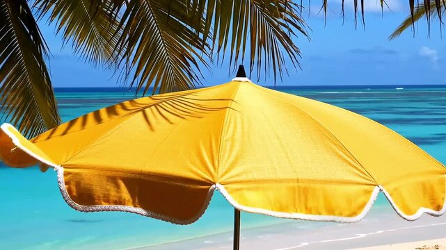 Beach umbrella close up with palm trees and ocean background