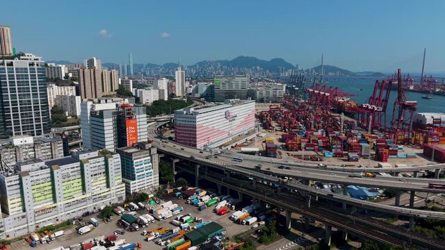 July 11 2026 Red gantry cranes load huge global container ships