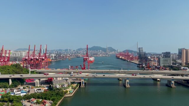 July 11 2026 Cargo vessels navigate busy deepwater shipping container channel.