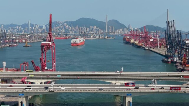 July 11 2026 Cargo vessels navigate busy deepwater shipping container channel.