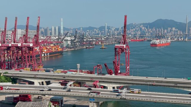 July 11 2026 Cargo vessels navigate busy deepwater shipping container channel.