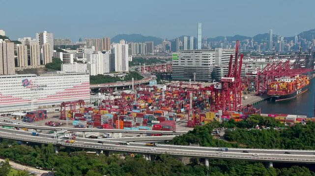July 11 2026 Cargo vessels navigate busy deepwater shipping container channel.