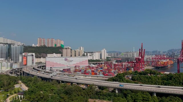 July 11 2026 Cargo vessels navigate busy deepwater shipping container channel.