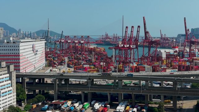 July 11 2026 Cargo vessels navigate busy deepwater shipping container channel.