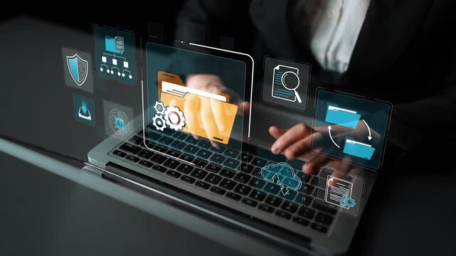 Professional business person working on laptop with data security icons and digital graphics overlay for technology and innovation concepts Sigmoid