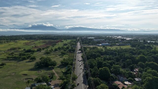 Morning Aerial Hyperlapse Over Dagupan-San Fabian Highway Towards Cordillera Mountains