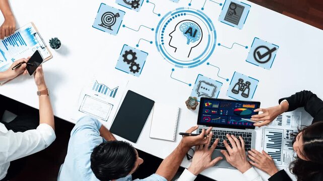 Collaborative Business Meeting with Focus on Artificial Intelligence Concepts and Data Visualization in Modern Office Environment. Entropy.