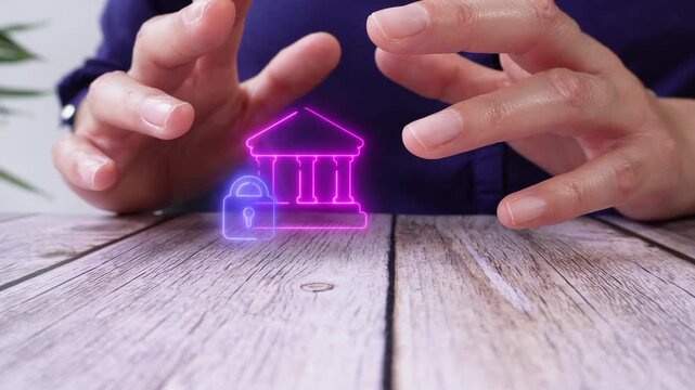 A person places their hands on a wooden table. A neon hologram of a locked house appears. Ideal for real estate, security, or technology presentations.
