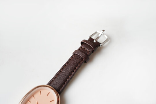 Close Up of Brown Leather Watch Strap and Metal Buckle with Copy Space