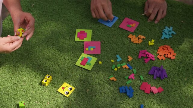 Older adults playing a therapeutic board game together