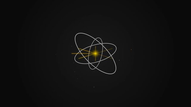 Animated atom model rotating with glowing nucleus on black background