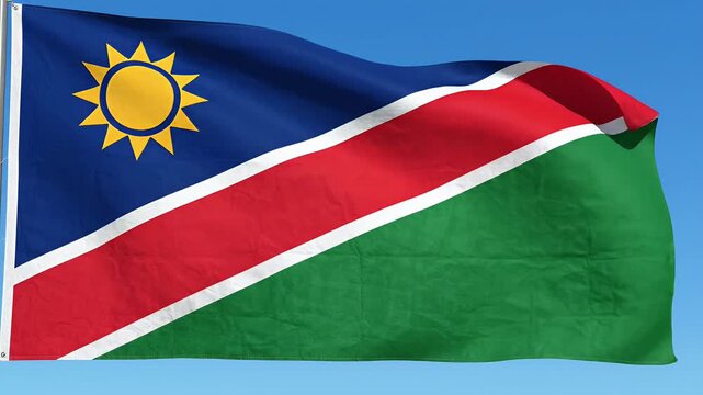 Namibian flag waving in the wind, national symbol, blue red white green sun emblem, patriotic, freedom, motion graphic footage