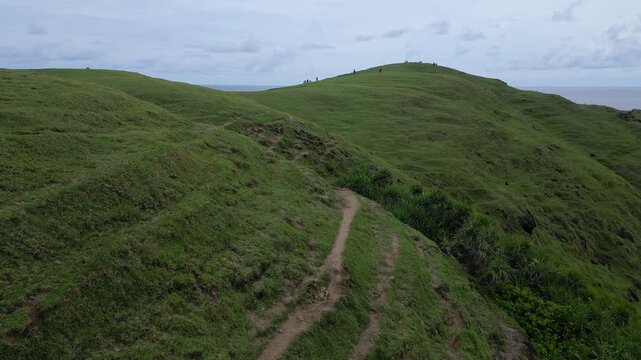 Wide Drone Shot Rugged Coastline And Ocean Under Moody Sky Deep Blue Water, Crashing Waves On Basalt Cliffs, Distant Islets, Cool Tones, Atmospheric Survey Footage, Bukit Merese, Lombok, Tanjung Ann