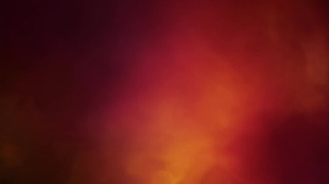 Rich crimson cinematic light leak with ruby red, burnt orange and dark amber gradients, creating a premium vintage film burn video overlay with realistic optical glow and seamless motion.