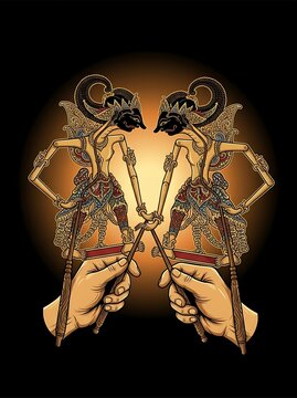 Hands performing traditional indonesian wayang kulit shadow puppets