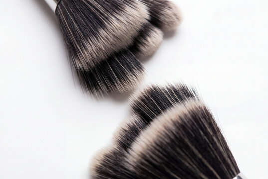 Close up of intersecting professional makeup brush bristles
