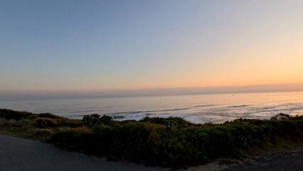 Fototapeta premium Sunset Over Ocean Horizon from Mornington Peninsula Coastal Road