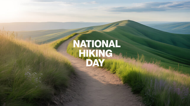 A scenic hiking trail winds through rolling green hills under a clear sky, celebrating National Hiking Day.