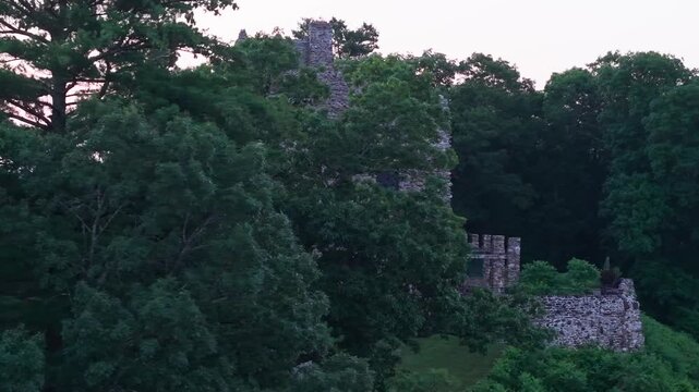 Summer aerial view featuring Gillette Castle in East Haddam, Connecticut at sunrise