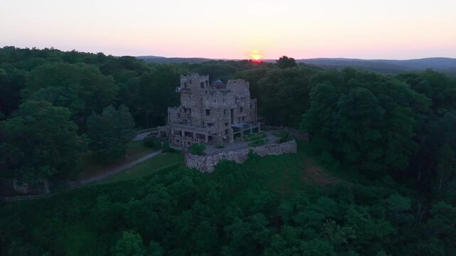 Summer aerial view featuring Gillette Castle in East Haddam, Connecticut at sunrise