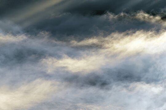 Misty Layers with Subtle Light Beams Blending Naturally Together