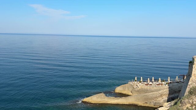 Sea, blue sky and summer beach on the Adriatic coast of Montenegro.