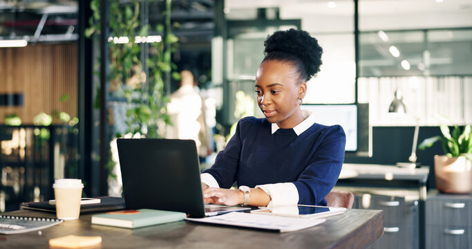 Laptop, typing and black woman in office with report, bookkeeping or finance administration for audit. Person, reading and browse in business with computer, review financial statement and accounting.