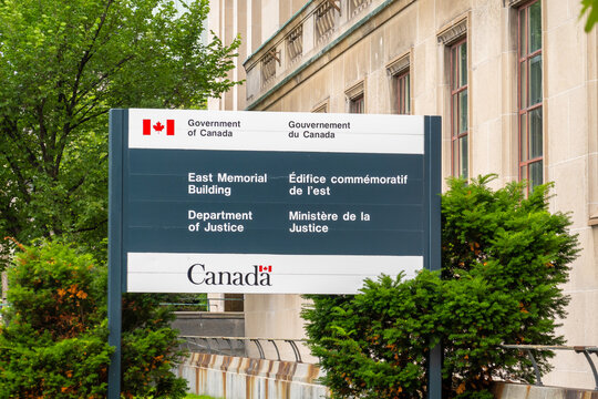 Ottawa, Ontario, Canada. July 17, 2026. The Department of Justice sign outside the East Memorial Building on a summer day.