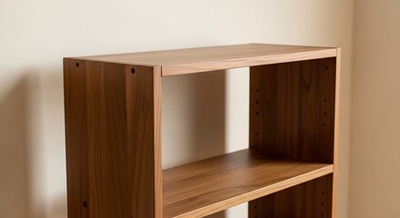 Fototapeta premium Brown wooden shelving unit against wall.