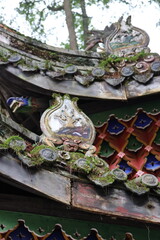 Ancient Chinese rooftop with unique ornamental motifs at Jianfu Temple in Mount Qingcheng in Dujiangyan, Chengdu, Sichuan Province of China © Crystaltmc