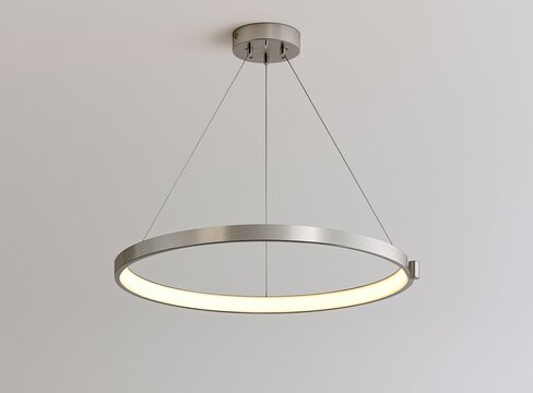 Modern circular LED ceiling light fixture with metal finish suspended by wires