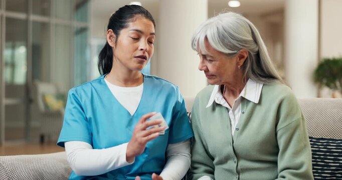 Caregiver, advice and old woman in clinic with pills, medical instructions or discussion for health. Senior person, nurse and talk in hospital with medicine, prescription or recommendation for drugs.