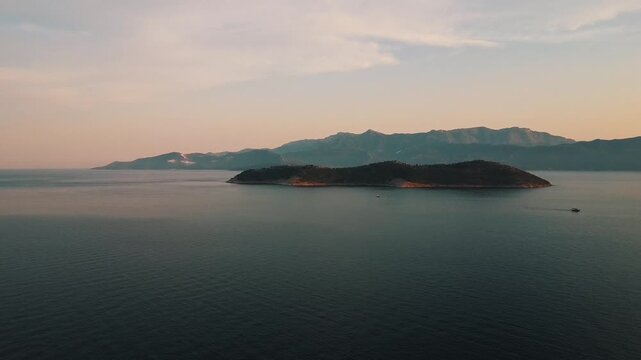 Cinematic Aerial View of a Secluded Island at Golden Hour